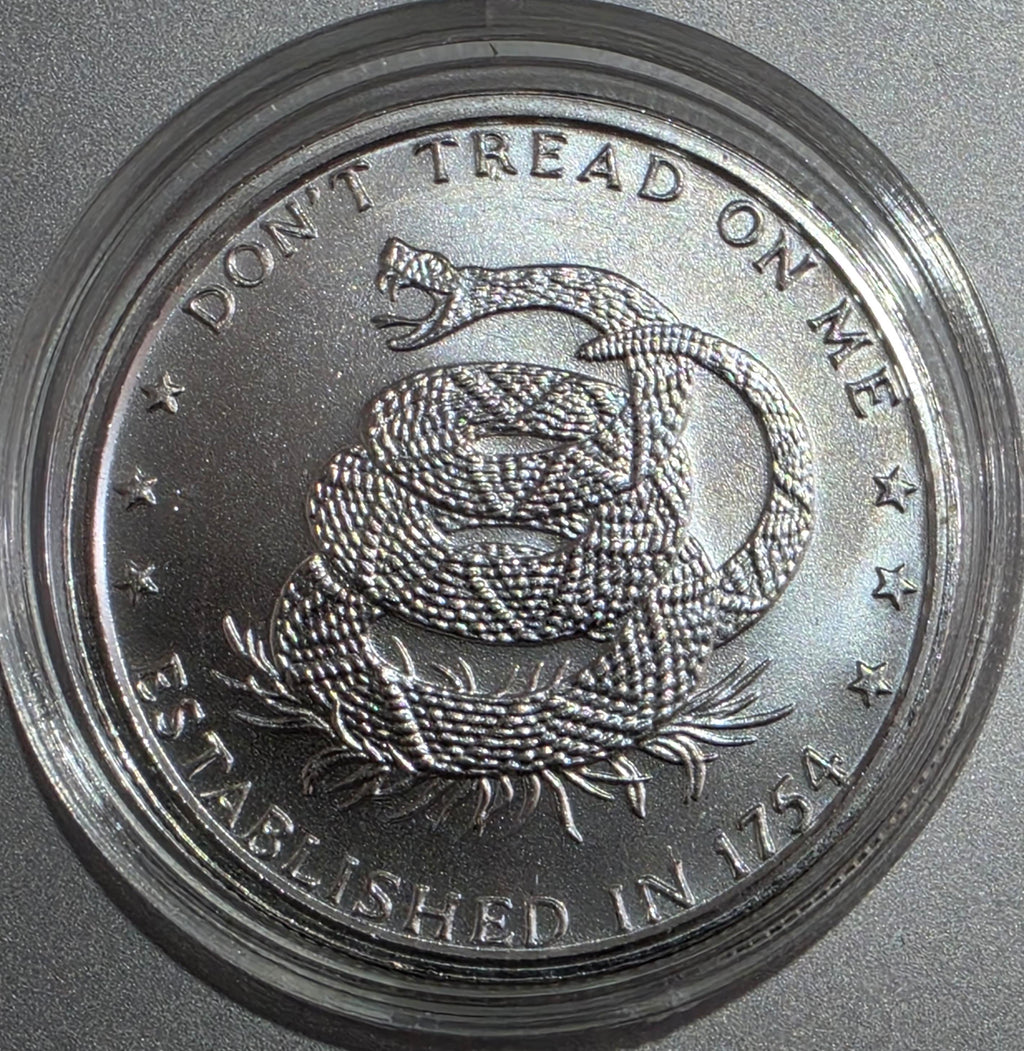 1 oz silver round featuring the "Don't Tread on Me" rattlesnake design